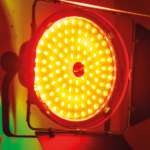 An orange light with barndoors