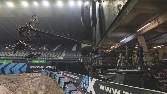 A camera extended over a race track