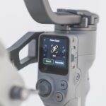 A small screen showing different modes on a camera gimbal