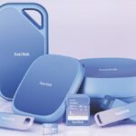A collection of light blue external computer storage devices in varying sizes