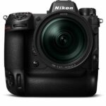 A black handheld camera by Nikon with rounded corners and a textured grip