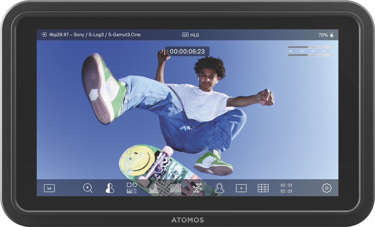 An Atomos tablet showing a picture of a person doing a flip with a skateboard