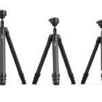 A line of tripods decreasing in size, against a white background