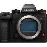 A black Lumix camera with a textured grip