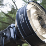 Aputure Storm Parallel Beam light set up outside in front of trees