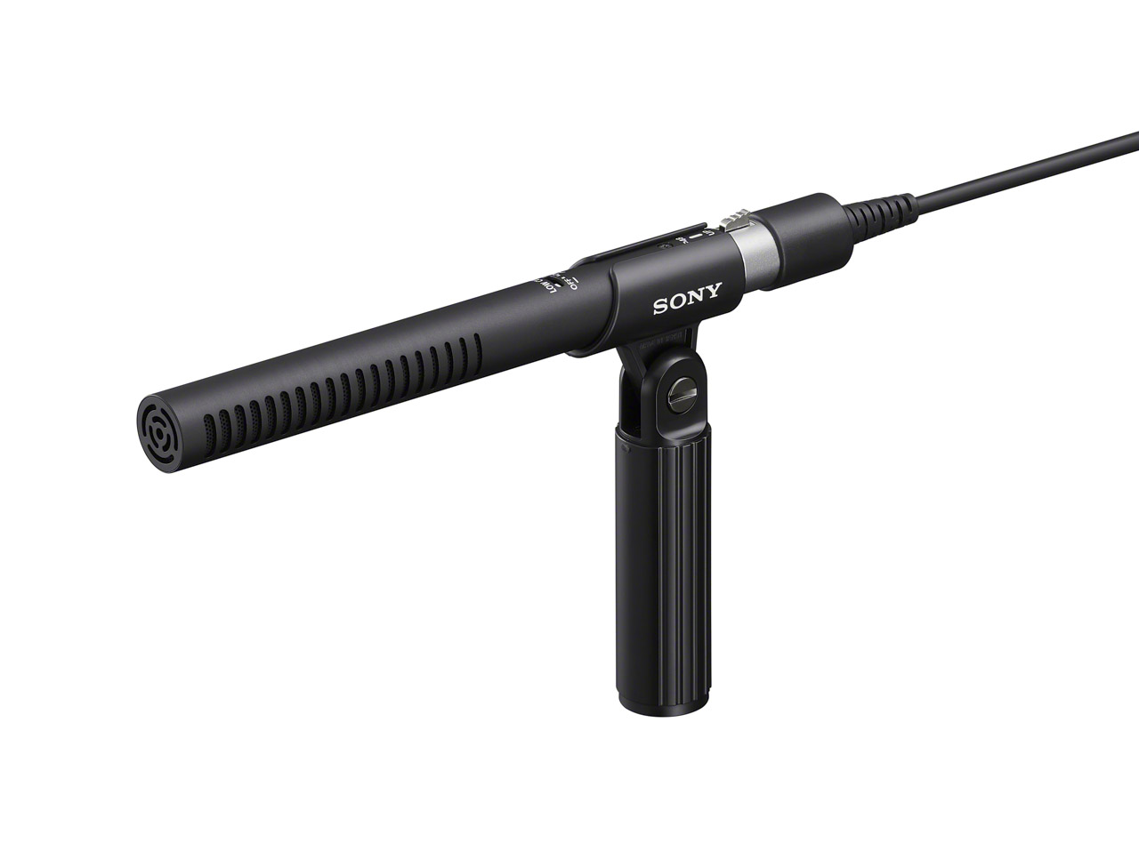 A thin black microphone on a stand with a wire coming out the back, against a white background