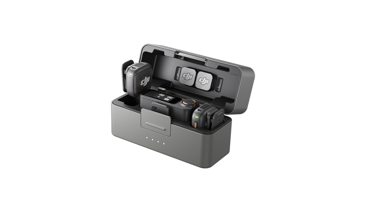 A kit from DJI with microphones packed in, against a white background