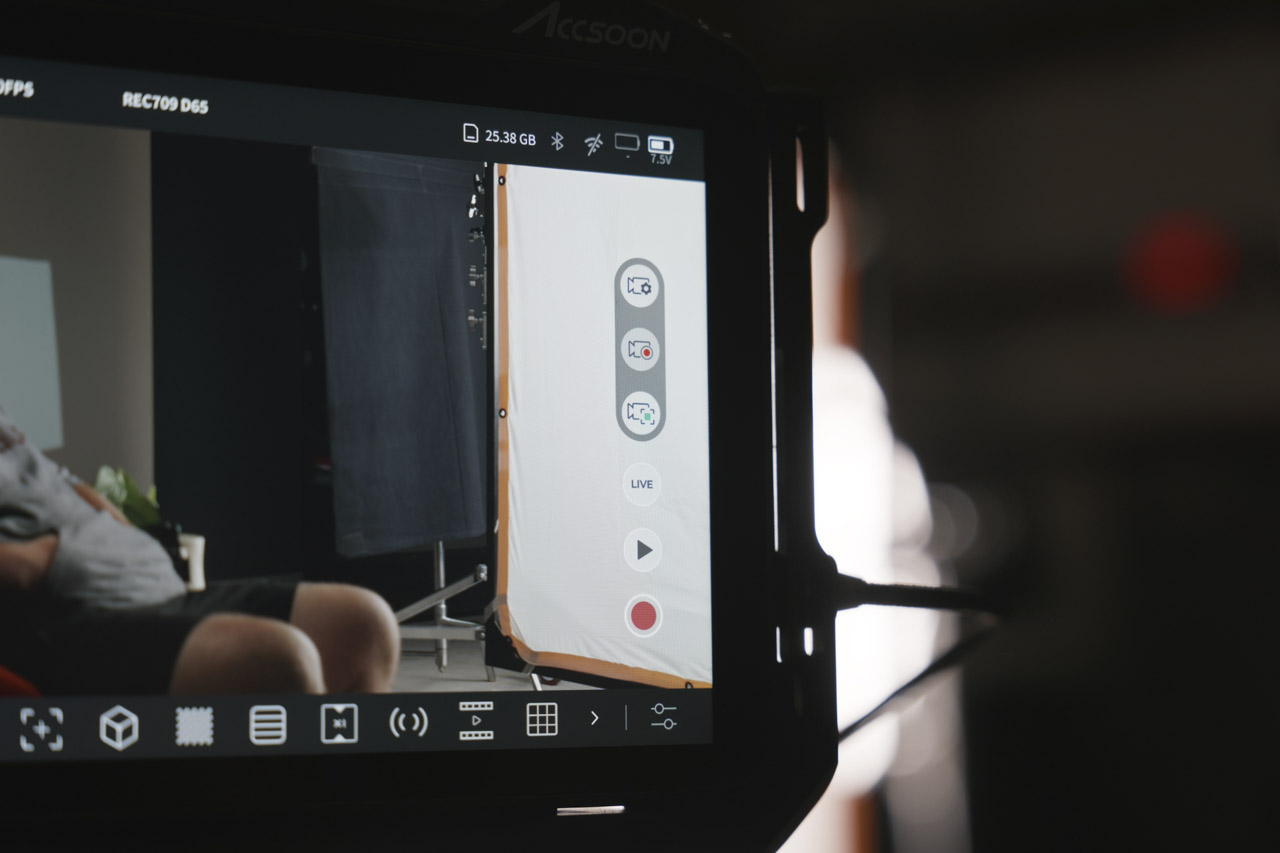 The side of a touchscreen with a wire attached