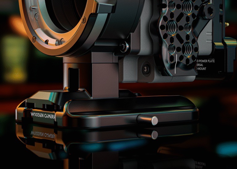 The bottom of a camera mount from Wooden Camera with a bolt hanging out of the side