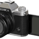 A Yashica camera with a foldable screen, against a white background