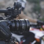 A professional filmmaking camera with a Sigma lens attached