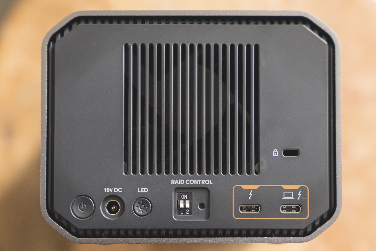 The metal enclosure is bolted together (left). The rear panel shows two Thunderbolt ports plus RAID settings (right) The rear panel of a Western Digital device showing numerous ports