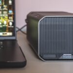 A large cube storage drive from Western Digital connected to a computer