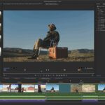 Adobe Premiere Pro editing software showing video clips of a man sitting in a chair with a box next to him in a desert landscape