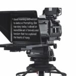 A teleprompter with words on a screen, against a white background