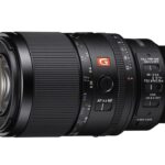 A lens from Sony laying horizontally, against a white background