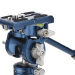 The blue head of a Benro tripod, against a white background
