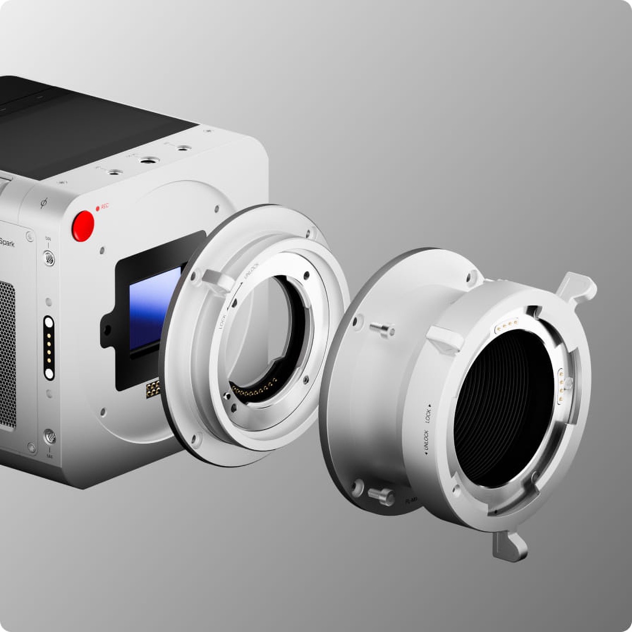 An image of a white camera from Pixboom with the individual components being taken apart