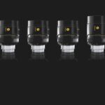 A line of black lenses with silver bases by Cooke, against a black background