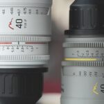 A white and a grey lens facing opposite ways from Ely's