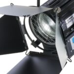 A professional hanging light from Litepanels with flaps, against a white background