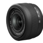 A Fujifilm lens facing the diagonal, against a white background