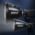 Two Nanlux lights facing to the left with a blue and black background