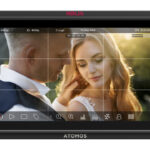A HDMI screen from Atomos, showing a man and woman on their wedding day in soft lighting