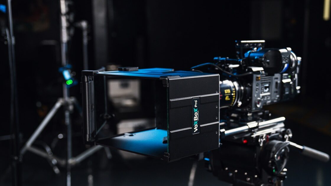 A camera system from PrimeLight Design, standing in a dark studio