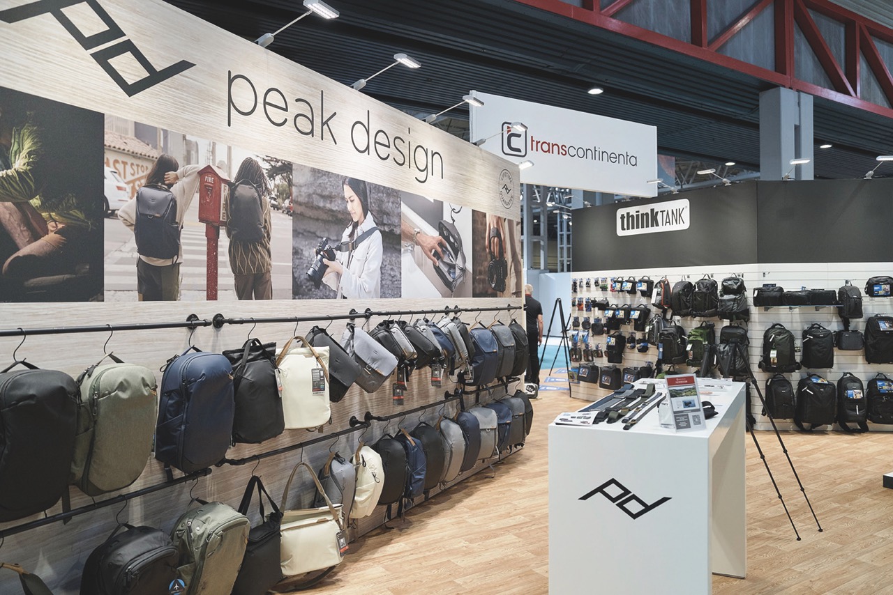The interior of a shop with rows of photography bags