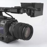 A Fujifilm GFX Eterna 55 camera, against a white surface