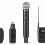 A row of different types of microphones from Shure, against a white background