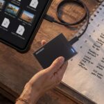 samsung p9 ssd storage device plugged into a laptop